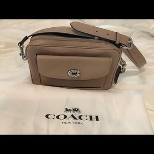 Coach Cassie Camera bag taupe with silver hardware.
